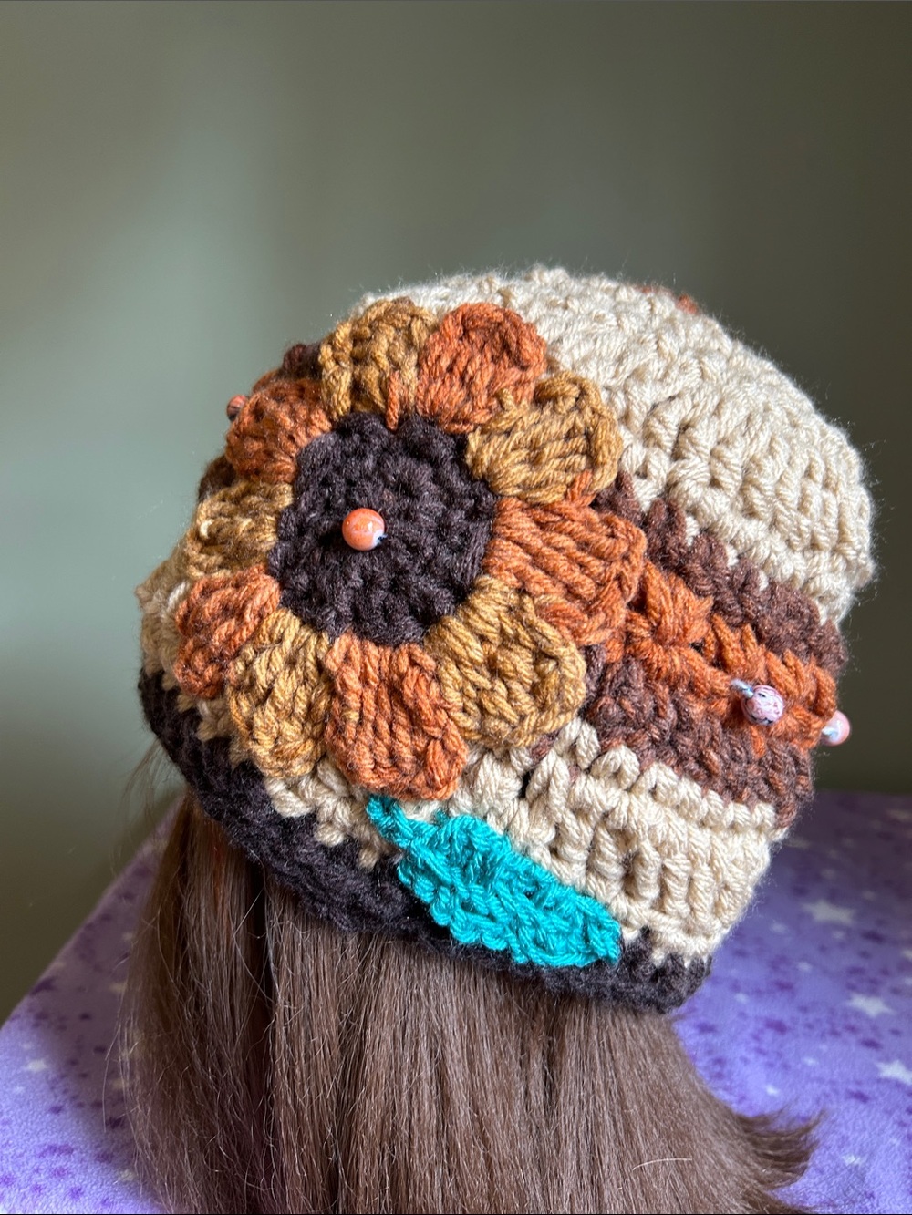 Crocheted Floral medium Beanie Hat in tan with Brown & Orange Accents